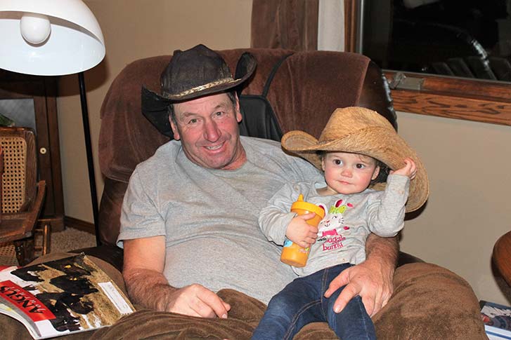 Grandpa Mark with his little cowgirl, granddaughter Summer.